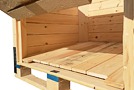 Crate with a hatch and slopped bottom